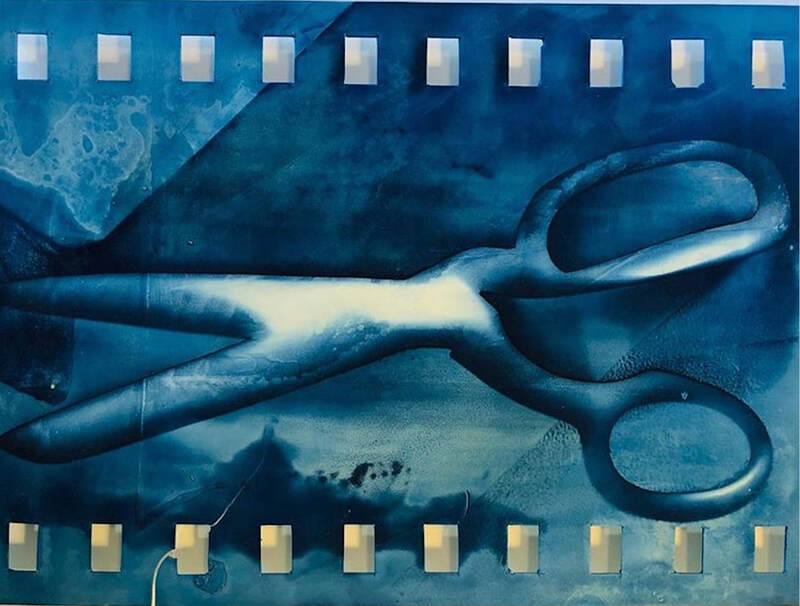 Cut Series of cyanotype prints on porcelain of scissors. Anne Butler Ceramics