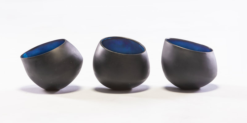 Tilt vessels. Black parian porcelain. Anne Butler Ceramics